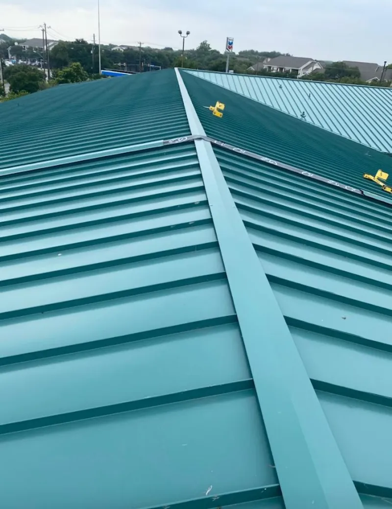 Green commercial metal roof ridge and valley for Metal Roof Repair in Leominster